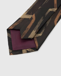 Back of STICKYZOO Obsidian Geometric Arrow Tie showing structured interlining, hand-finished folds and slip stitching, 145 × 8 cm