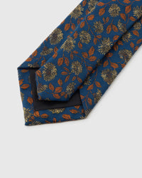 STICKYZOO Cobalt Copper Bloom Tie reverse showing structured interlining and hand-finished slip stitching, 145 × 8 cm.