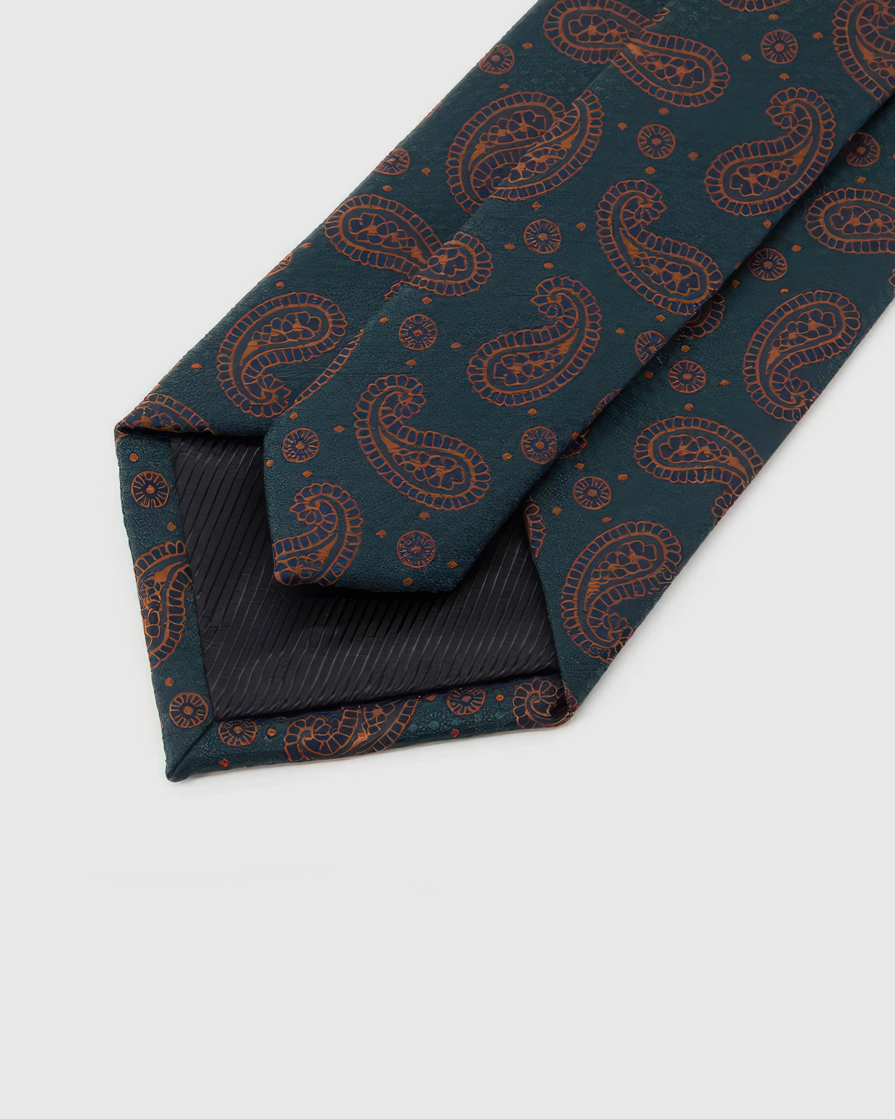 STICKYZOO Petrol Copper Paisley Tie reverse showing structured interlining and hand-finished slip stitching, 145 × 8 cm.
