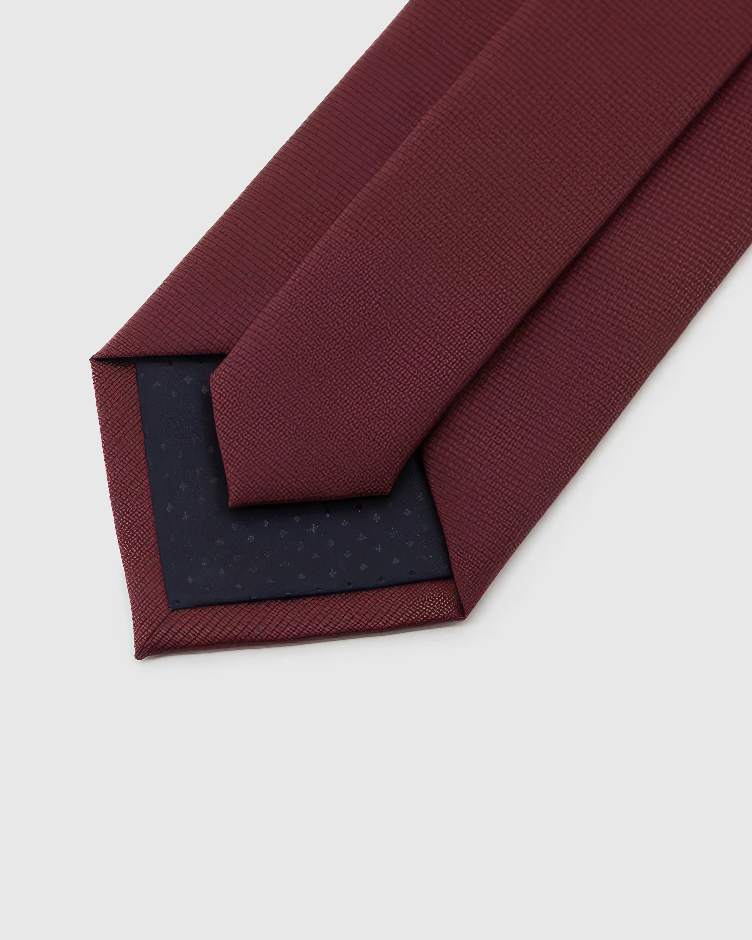 STICKYZOO Claret Texture Tie reverse showing structured interlining and hand-finished construction, 145 × 8 cm.