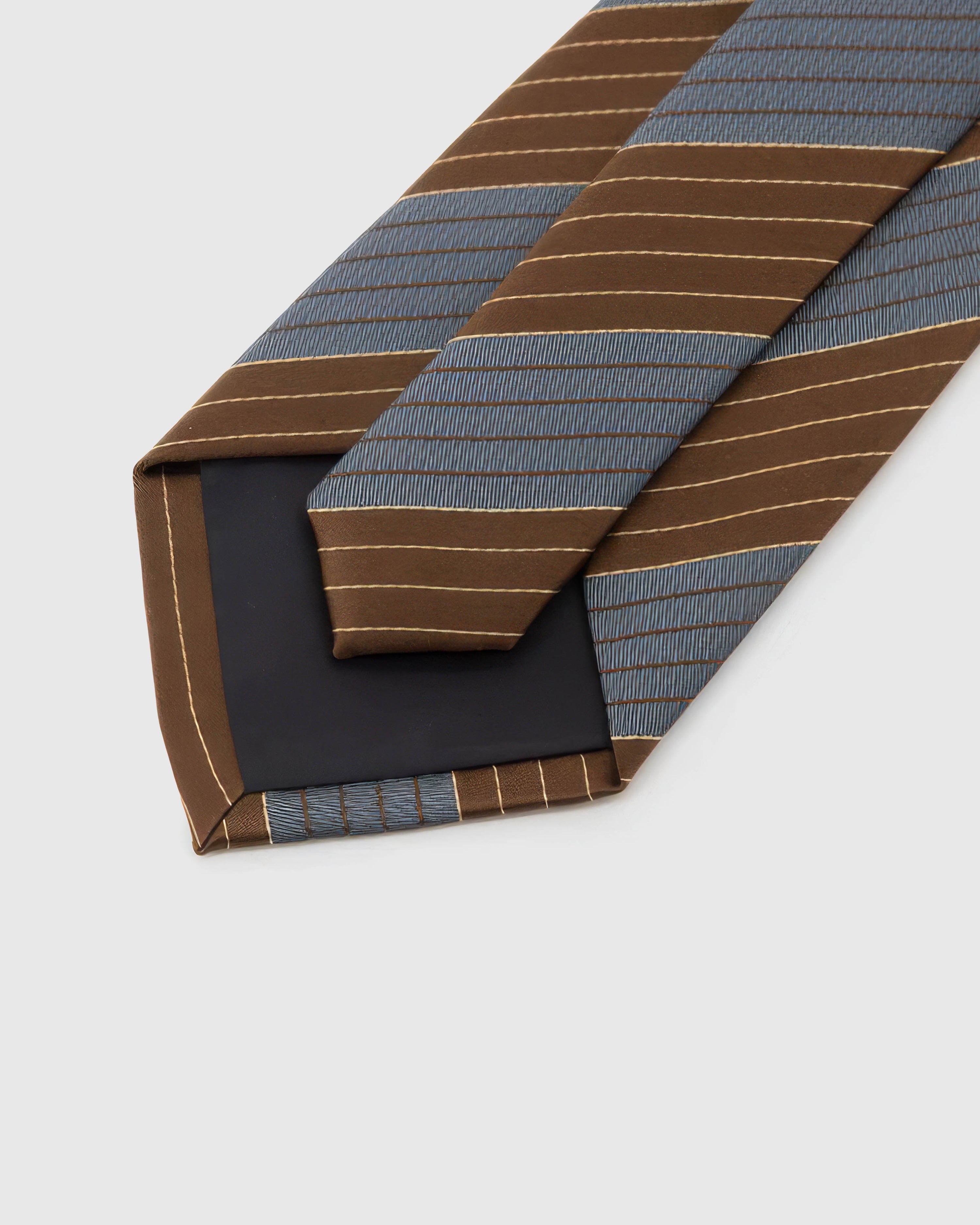 Back of STICKYZOO Umber Slate Stripe Tie showing black structured interlining, hand-finished folds and keeper, 145 × 8 cm
