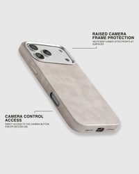 Raised metal camera frame and open Camera Control cutout on the cream textured vegan leather iPhone case