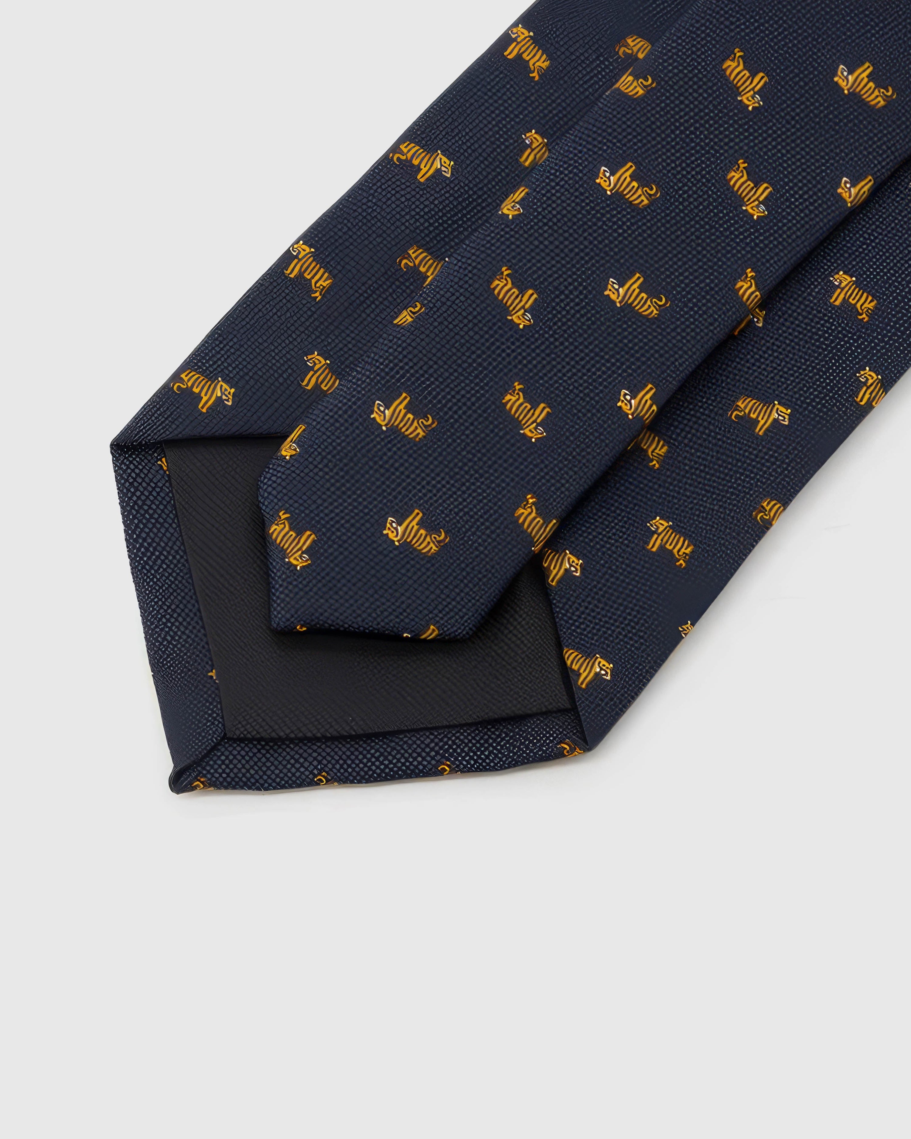 STICKYZOO Midnight Golden Tiger Tie reverse showing structured interlining and hand-finished construction, 145 × 8 cm.