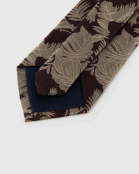 Back of STICKYZOO Espresso Tropical Leaf Tie showing structured interlining, hand-finished folds and slip stitching, 145 × 8 cm
