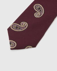 Ivory-gilt paisleys across burgundy crosshatch silk, hand-embroidered with raised thread by STICKYZOO