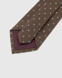 Back of STICKYZOO Walnut Quatrefoil Tie showing burgundy structured interlining, hand-finished folds and keeper, 145 × 8 cm