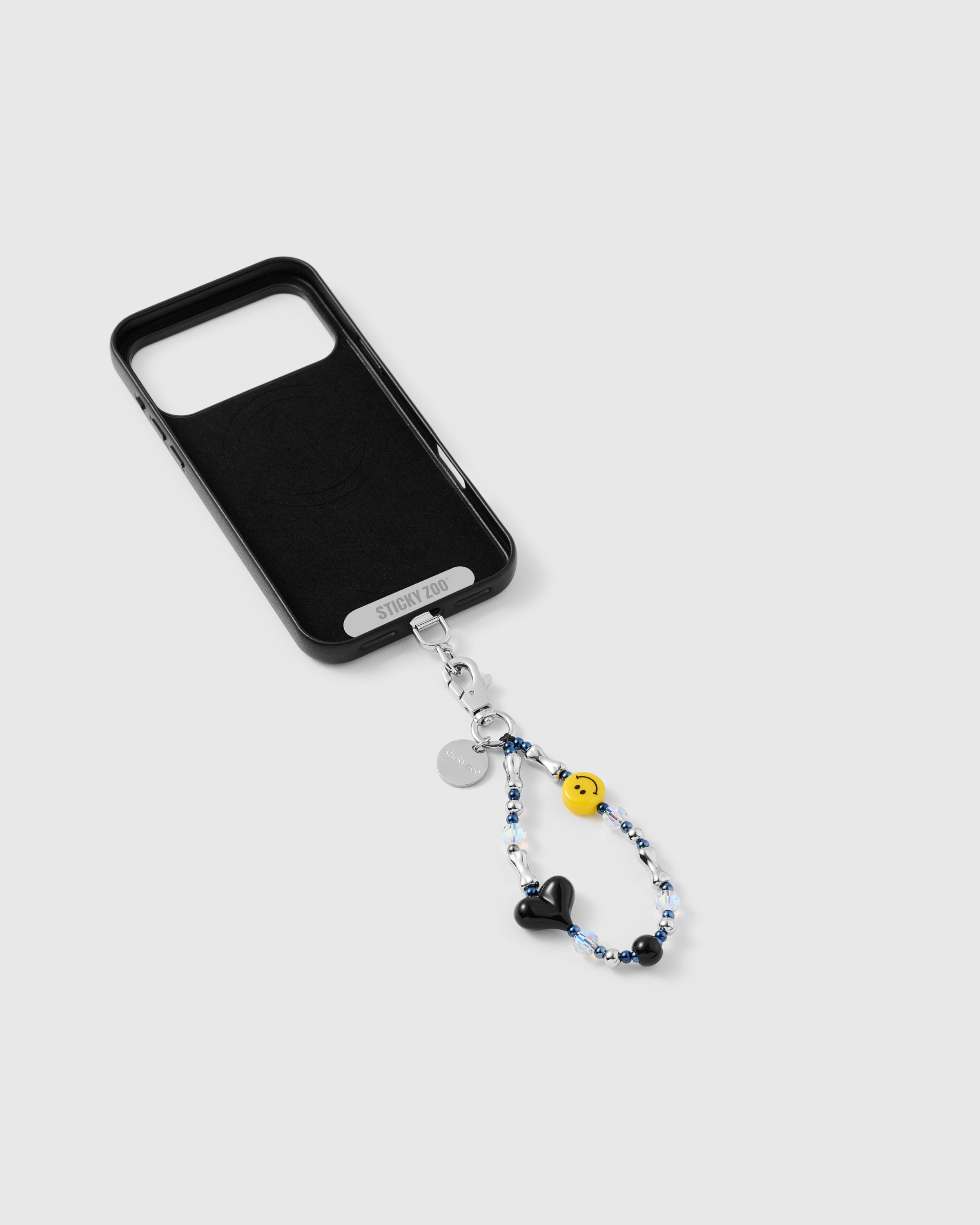 SMILEY BLACK HEART PHONE STRAP