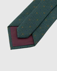 Back of STICKYZOO Forest Micro Tile Tie showing burgundy structured interlining, hand-finished folds and keeper, 145 × 8 cm
