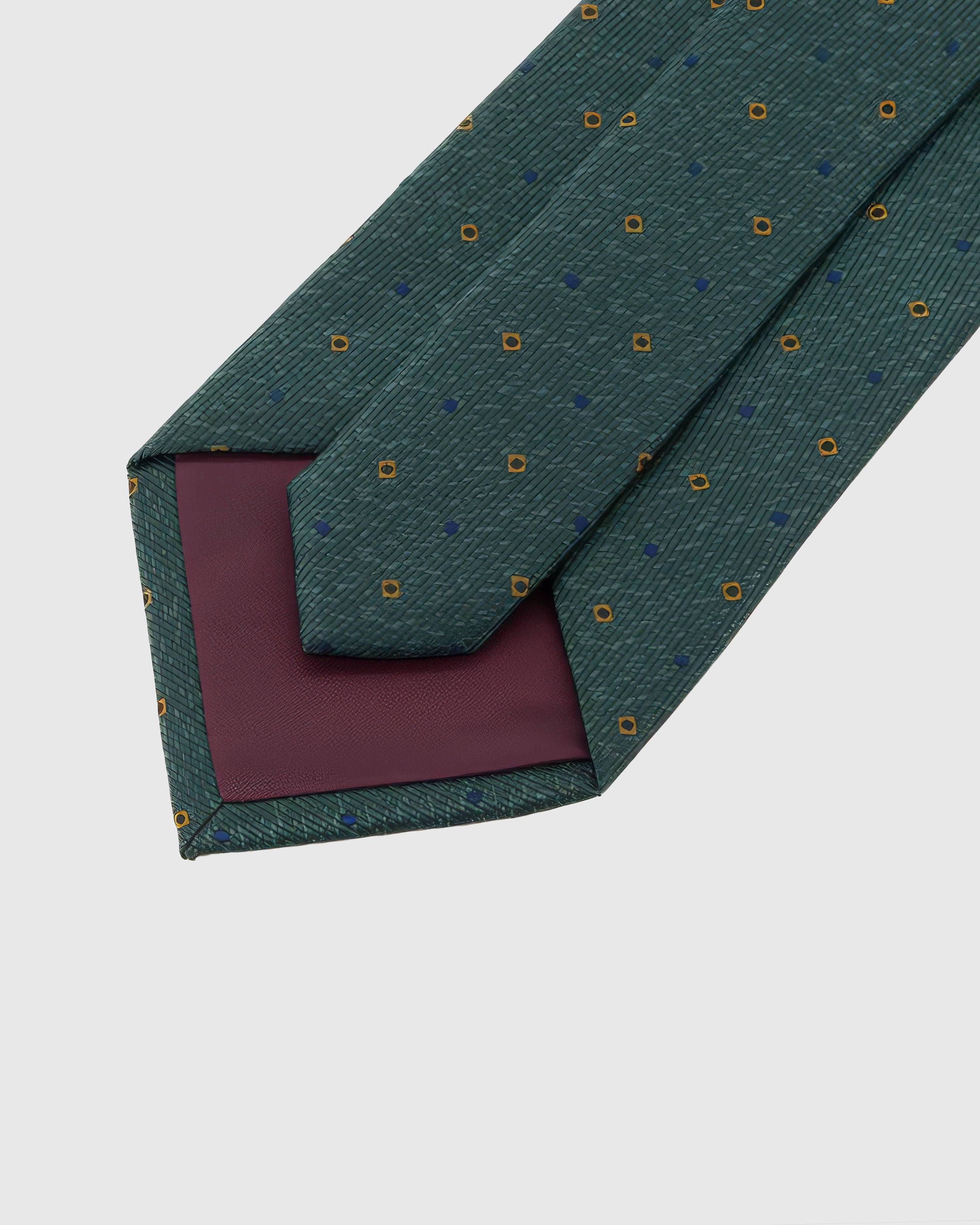 Back of STICKYZOO Forest Micro Tile Tie showing burgundy structured interlining, hand-finished folds and keeper, 145 × 8 cm