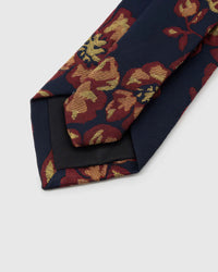 STICKYZOO Navy Gilded Bloom Tie reverse showing structured interlining and hand-finished slip stitching, 145 × 8 cm.