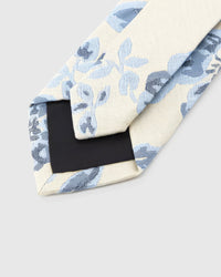 STICKYZOO Ivory Porcelain Bloom Tie reverse showing structured interlining and hand-finished slip stitching, 145 × 8 cm.