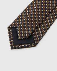 STICKYZOO Espresso Chevron Tie reverse showing structured interlining and hand-finished construction, 145 × 8 cm.