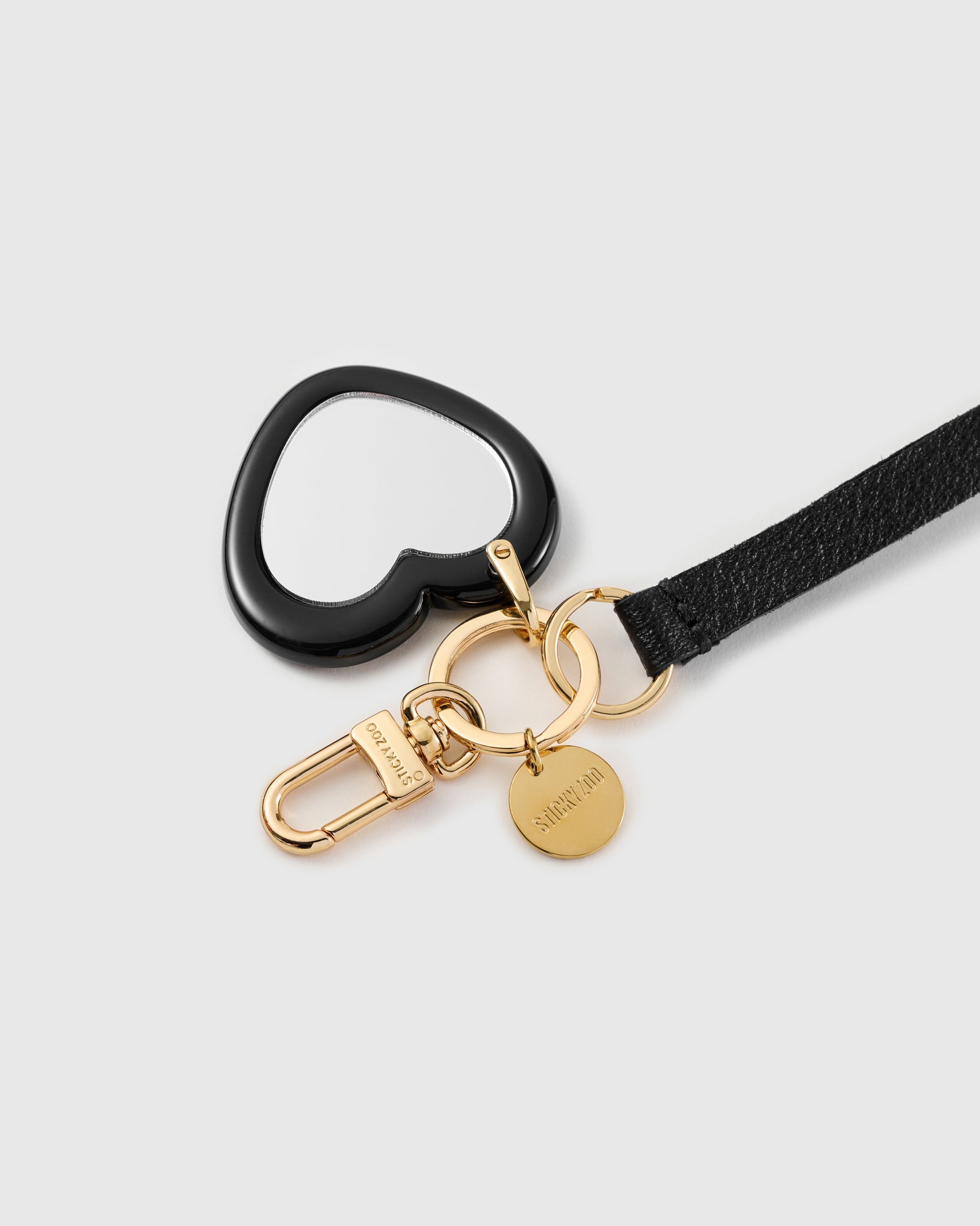 MIRROR HEART LEATHER PHONE STRAP
