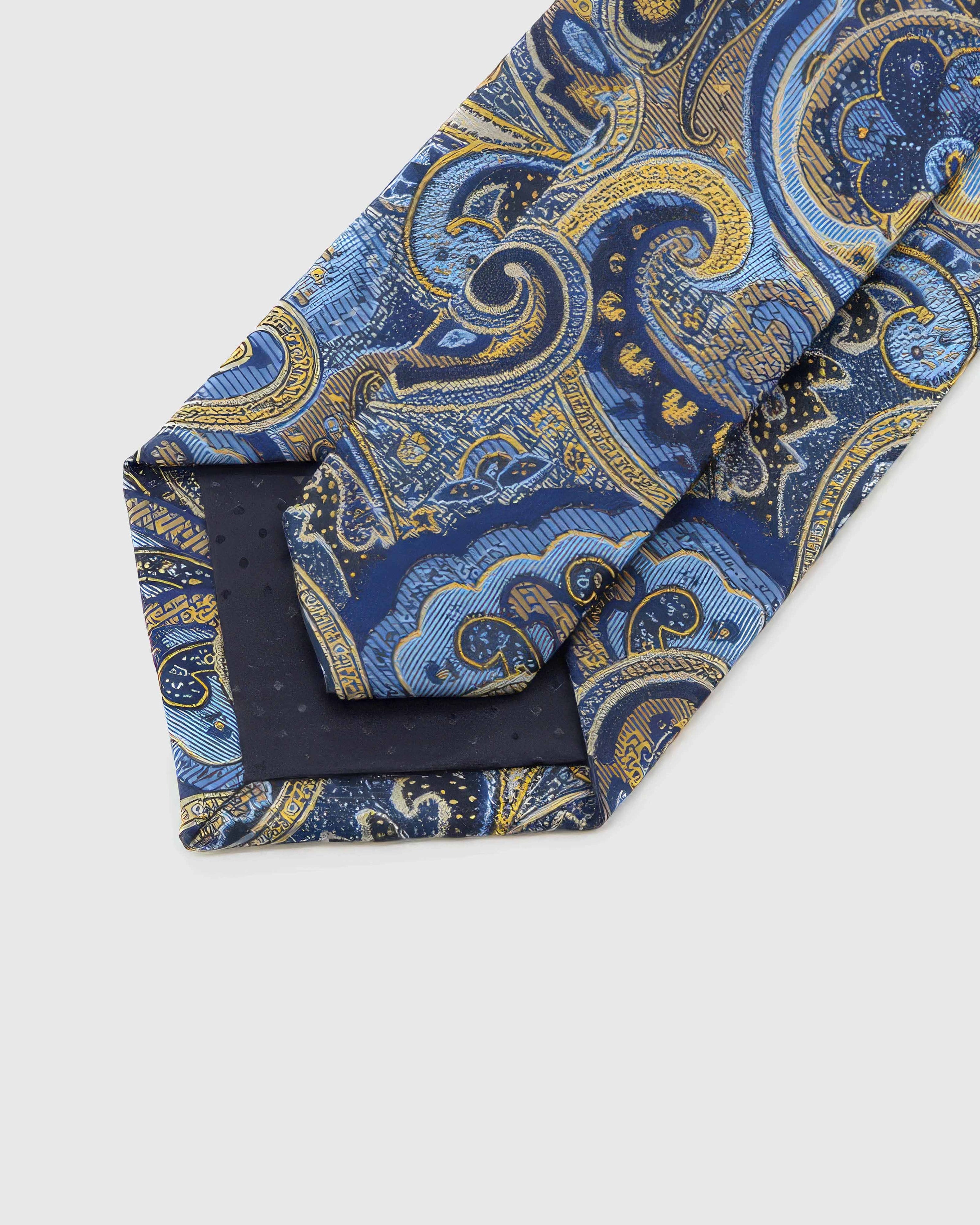 Back of STICKYZOO Cobalt Baroque Tie showing dark navy structured interlining, hand-finished folds and keeper, 145 × 8 cm