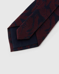 Back of STICKYZOO Claret Shadow Bloom Tie showing structured interlining, hand-finished folds and slip stitching, 145 × 8 cm