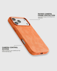 Raised metal camera frame and open Camera Control cutout on the orange textured vegan leather iPhone case