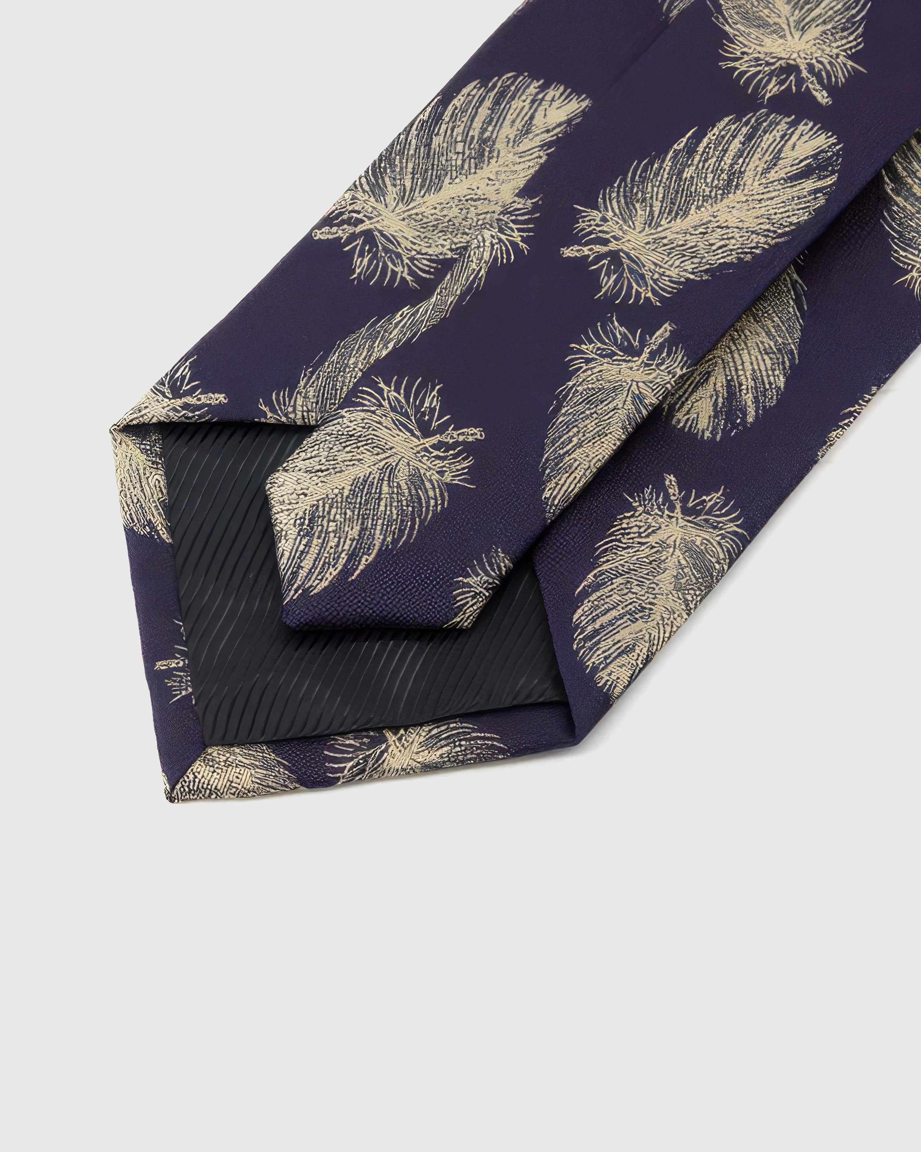 STICKYZOO Aubergine Gilded Feather Tie reverse showing structured interlining and hand-finished slip stitching, 145 × 8 cm.