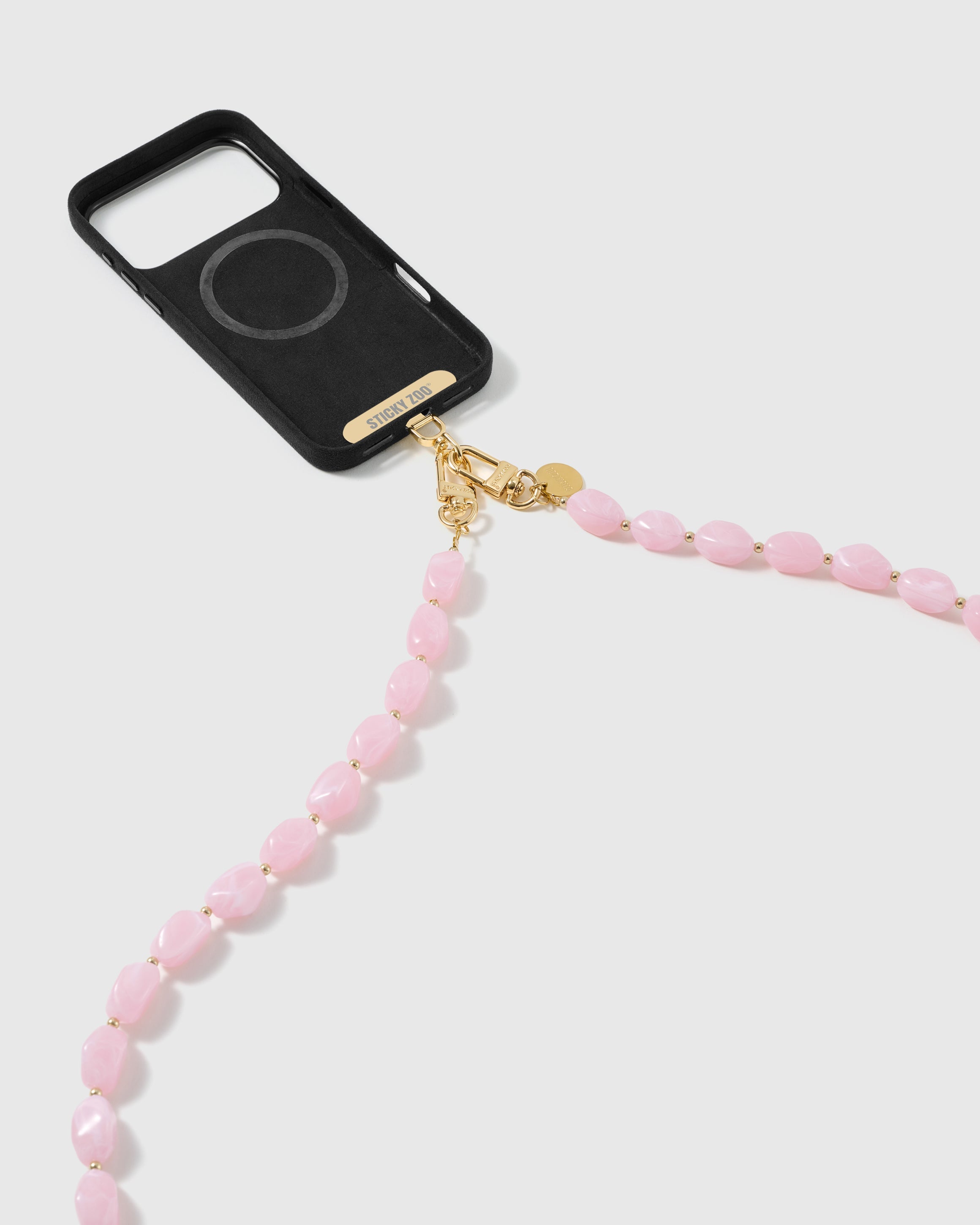 Dual-clasp beaded cross-body strap clipped to a phone case, showing universal fit via the included Phone Strap Card