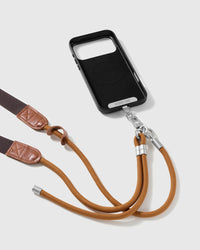STICKYZOO amber adjustable strap attached through a Phone Strap Card with the sliding ring visible