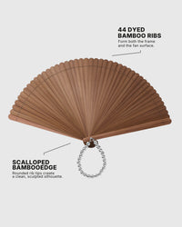 Open brown hand fan showing 44 dyed bamboo ribs and scalloped edge