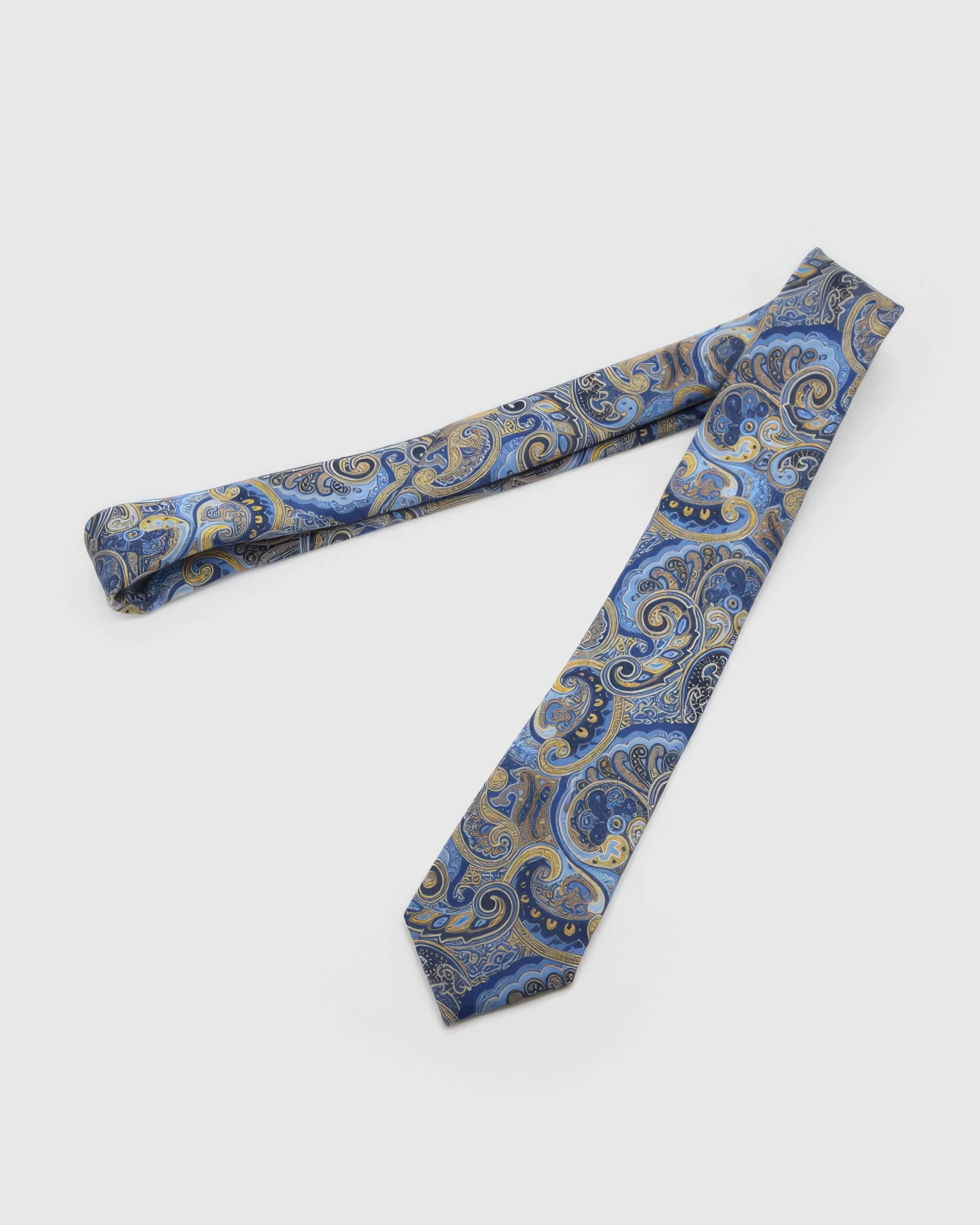 Full-length STICKYZOO Cobalt Baroque Tie laid flat on white, showing the complete ornate baroque paisley scrollwork repeat and 145 × 8 cm proportions