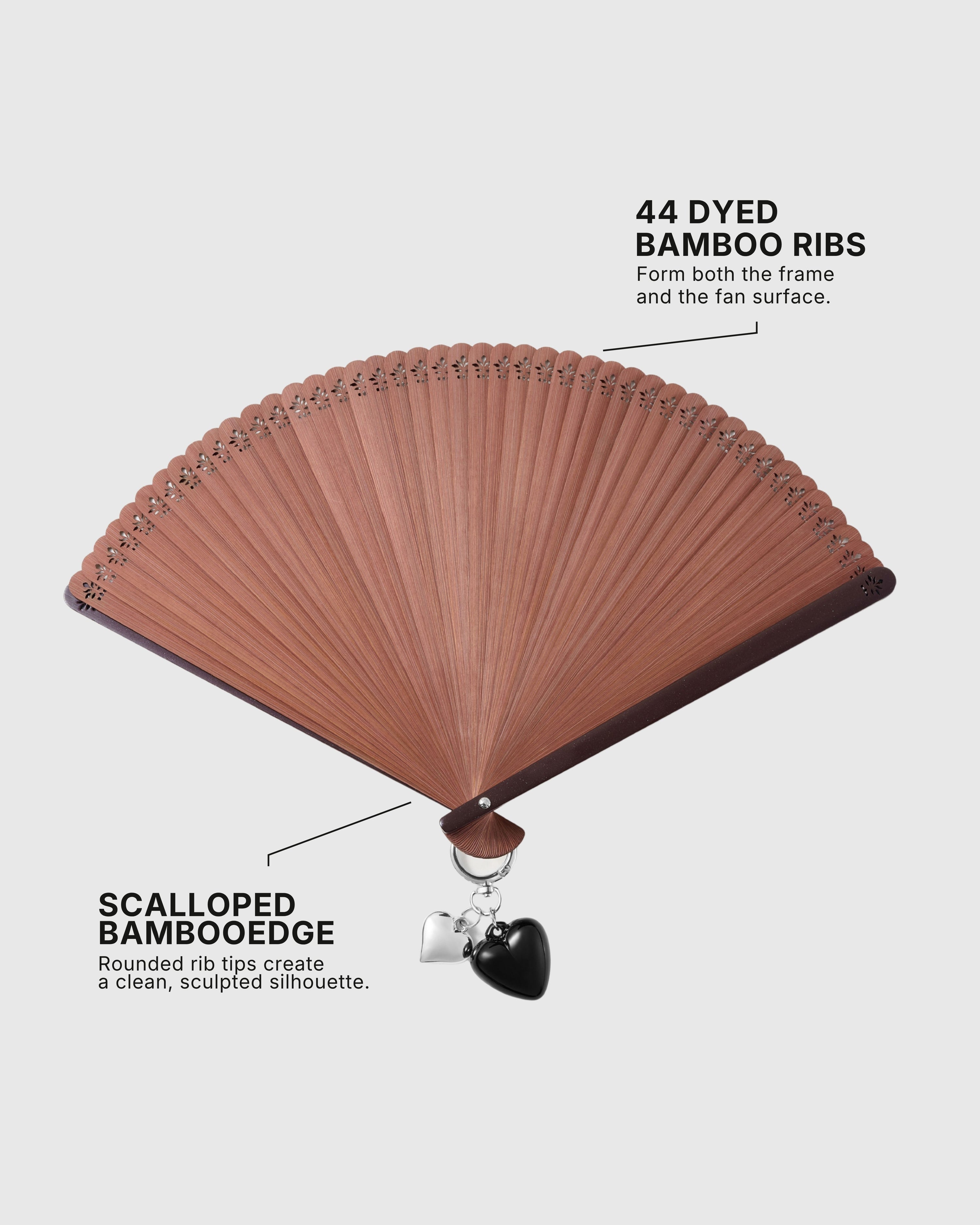 Open chestnut hand fan showing 44 dyed bamboo ribs and scalloped edge