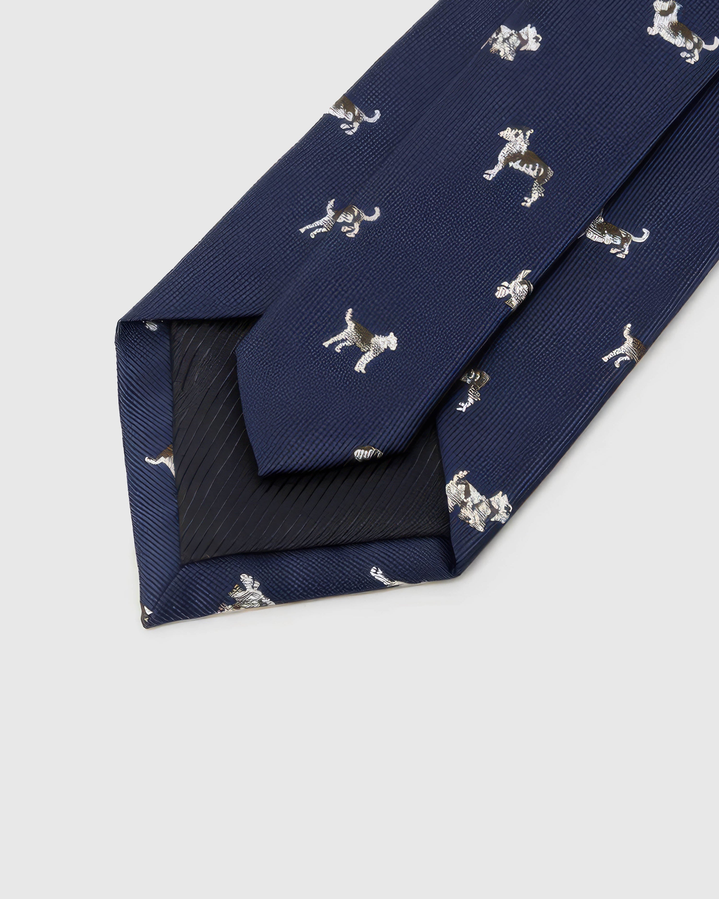 STICKYZOO Midnight Dog Parade Tie reverse showing structured interlining and hand-finished construction, 145 × 8 cm.