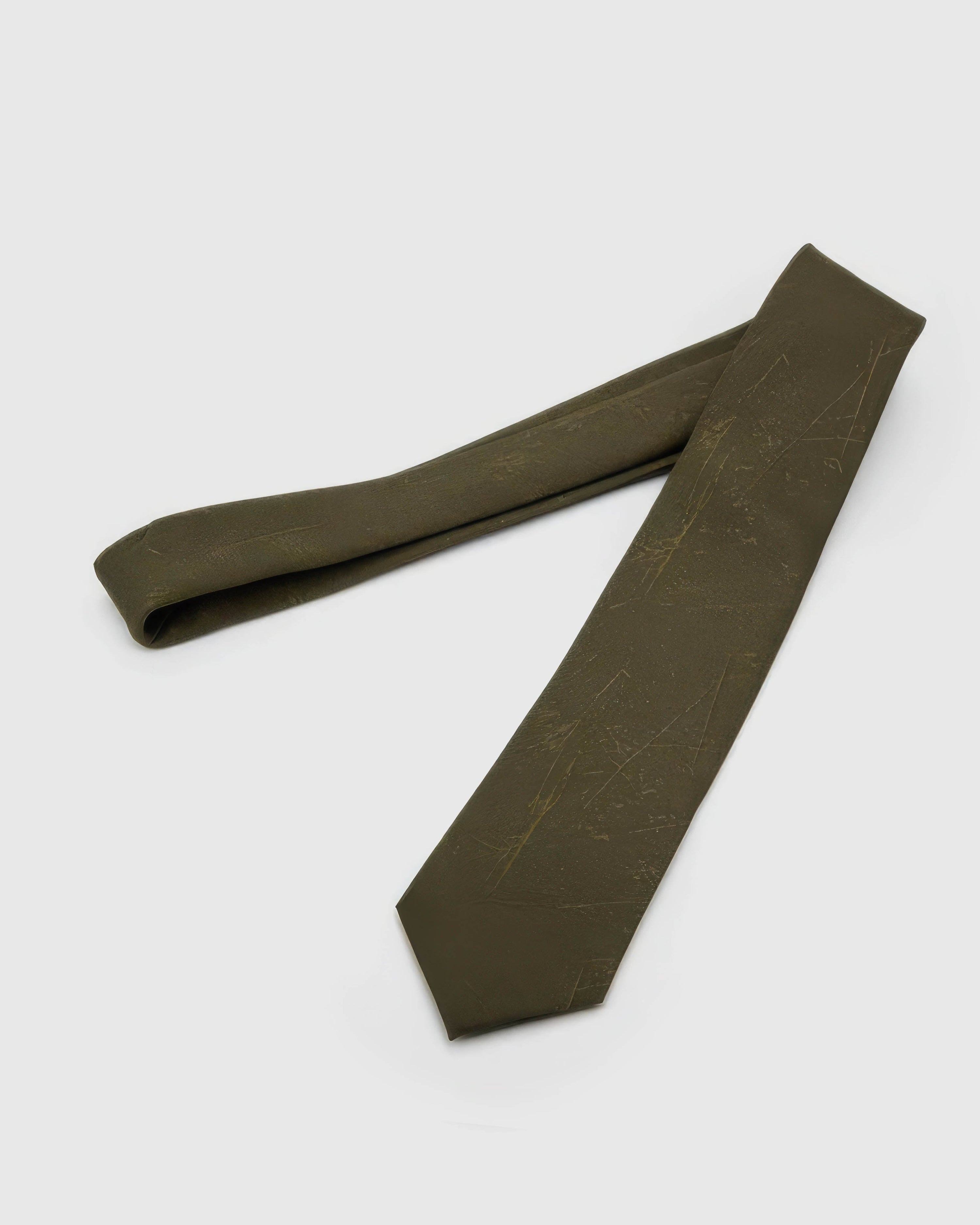 Full-length STICKYZOO Moss Relief Texture Tie showing tonal relief marks across a 145 × 8 cm hand-finished mulberry silk tie