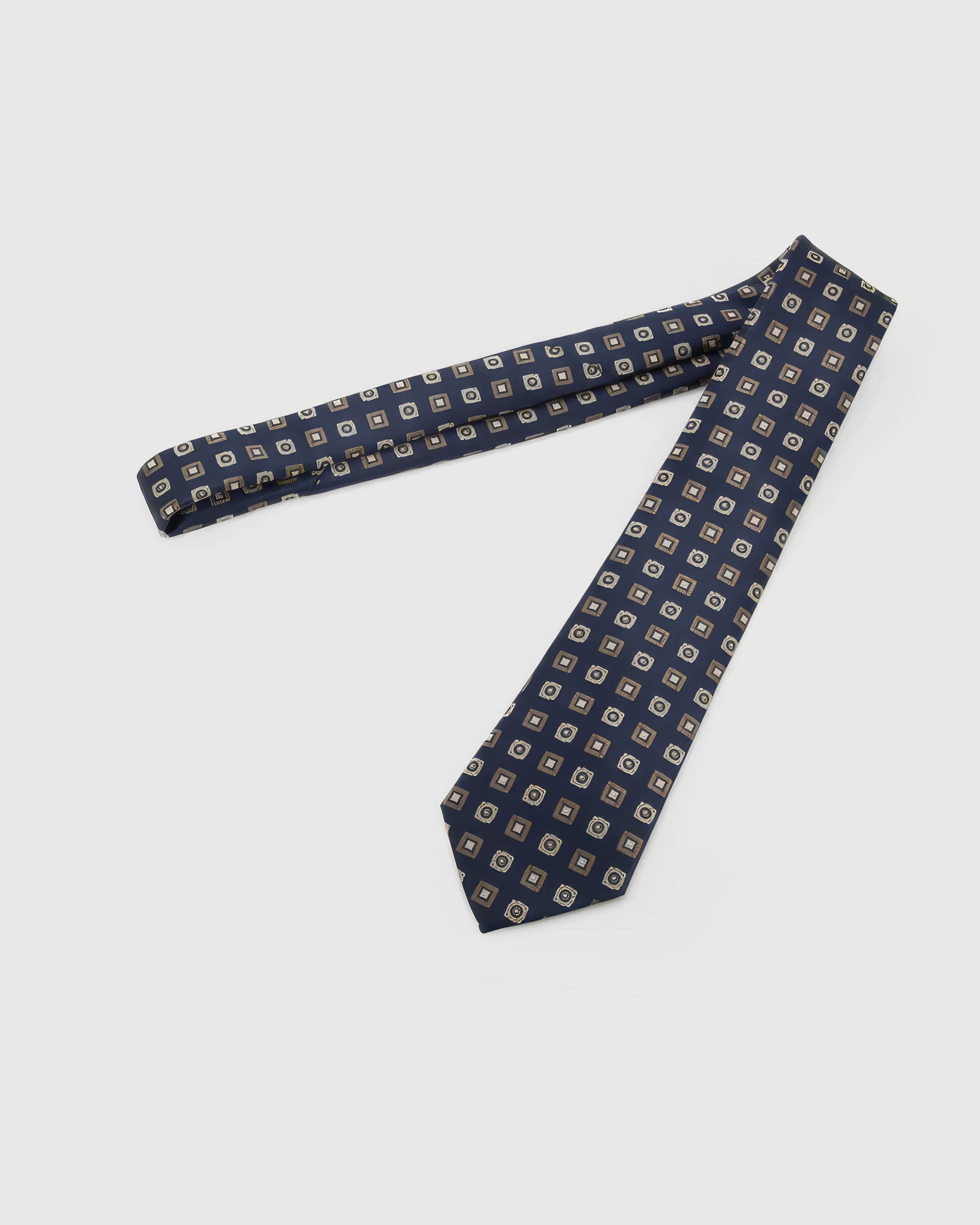 Full-length STICKYZOO Navy Medallion Tile Tie laid flat on white, showing the complete alternating tiles and rosette medallions repeat and 145 × 8 cm proportions