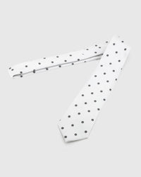 Full-length STICKYZOO Pearl Onyx Dot Tie laid flat on white, showing the complete onyx polka dots repeat and 145 × 8 cm proportions