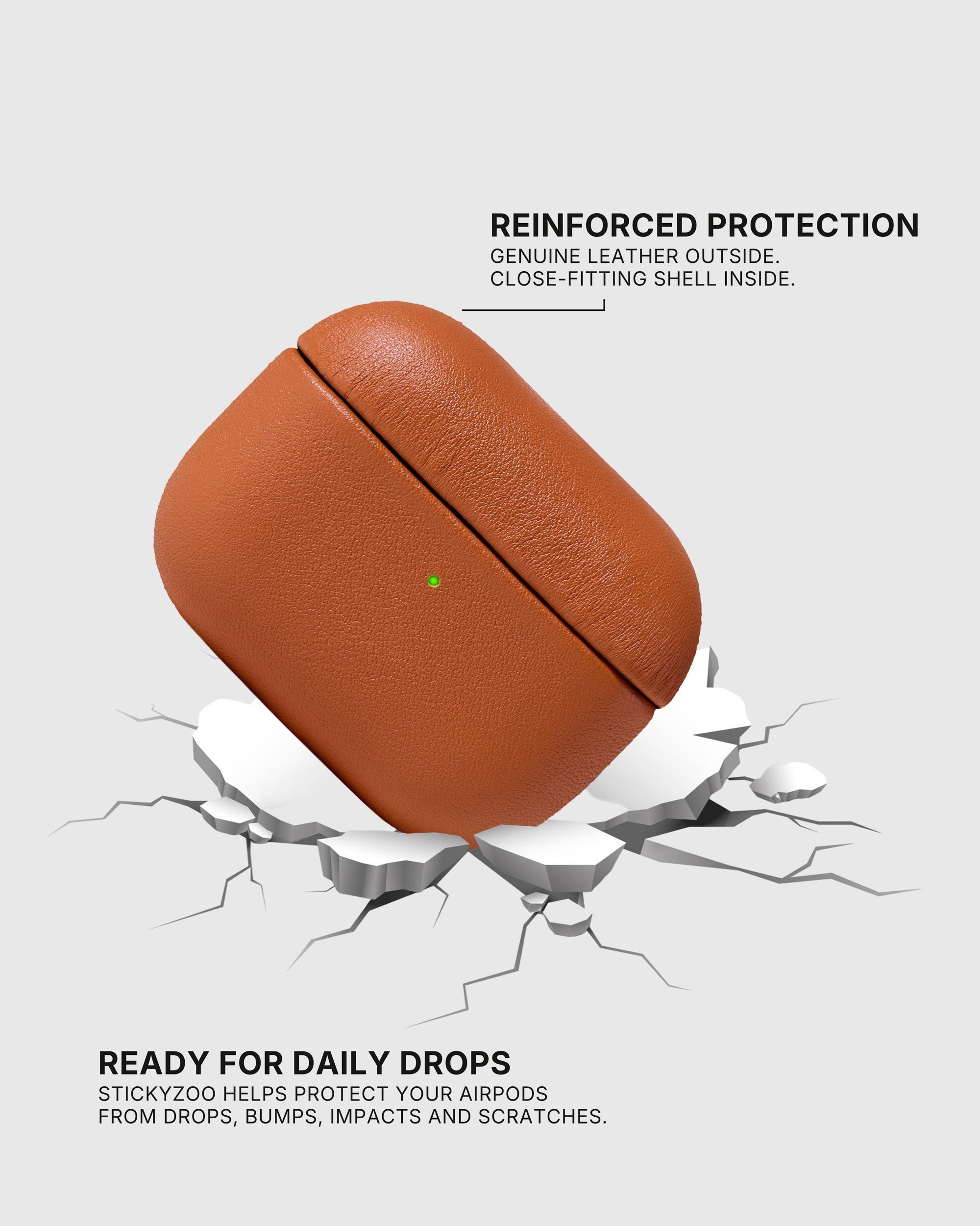 Cognac AirPods case landing on a cracked surface to illustrate drop protection