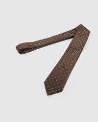Full-length STICKYZOO Walnut Quatrefoil Tie laid flat on white, showing the complete small ivory and pale-blue quatrefoils repeat and 145 × 8 cm proportions