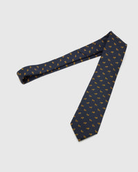 Midnight Golden Tiger Tie laid full length to show midnight ground with compact golden tiger motifs from blade to tail.