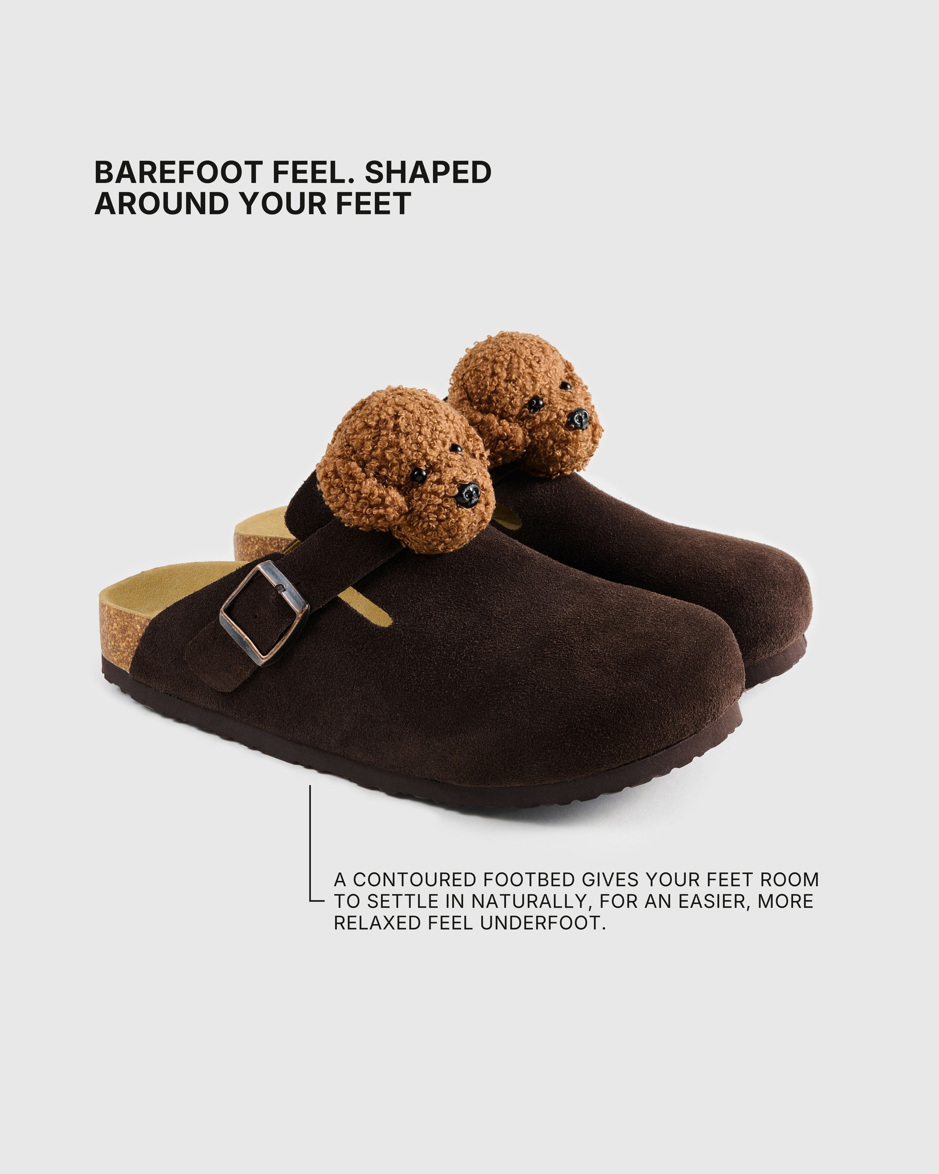 Shaped footbed inside the poodle brown suede clogs with an adjustable buckle strap