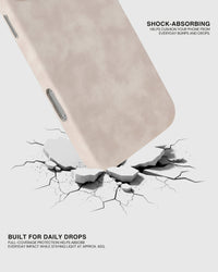 Shock-absorbing full-coverage shell of the cream vegan leather iPhone case protecting against daily drops
