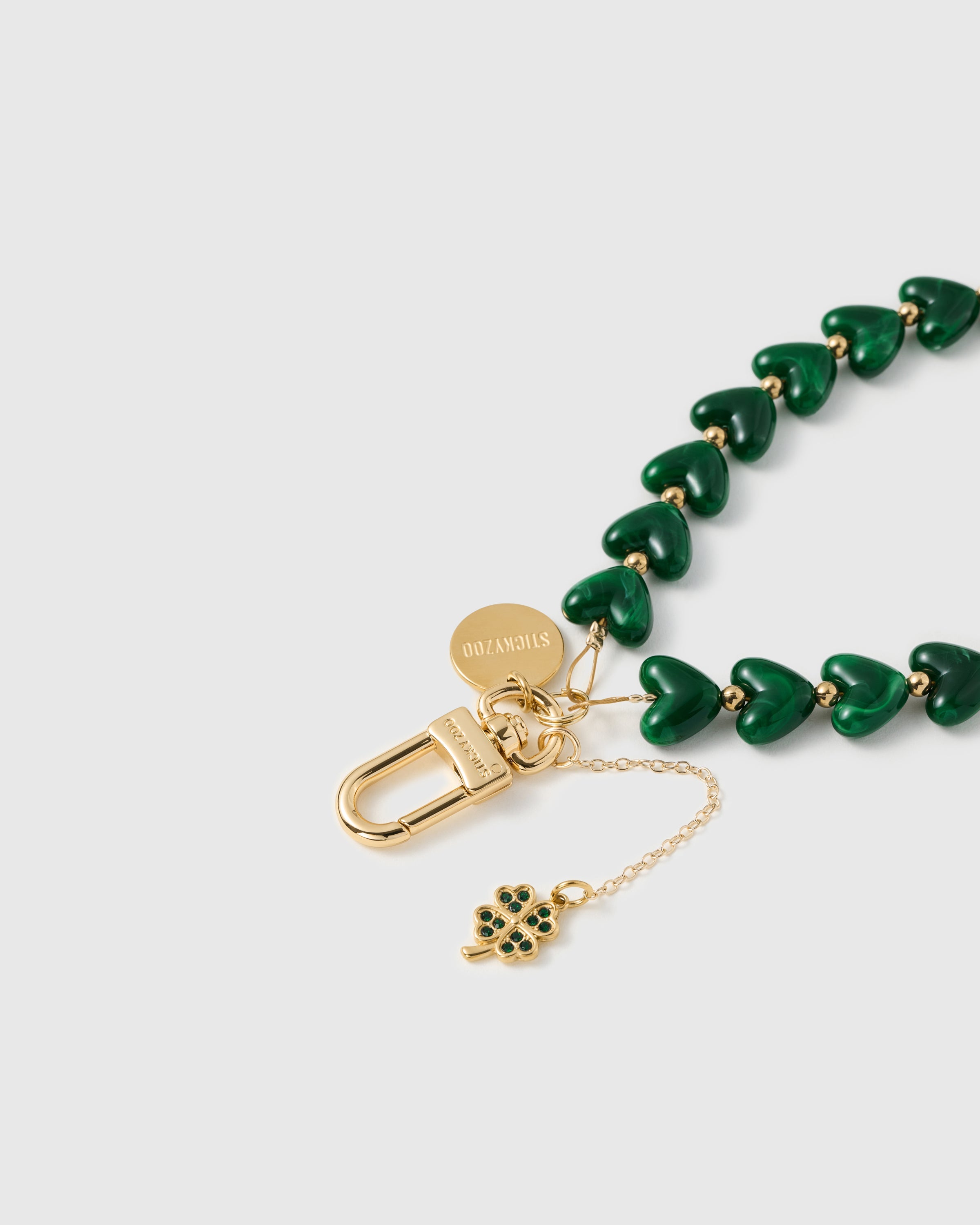 EMERALD CLOVER HEART PHONE STRAP