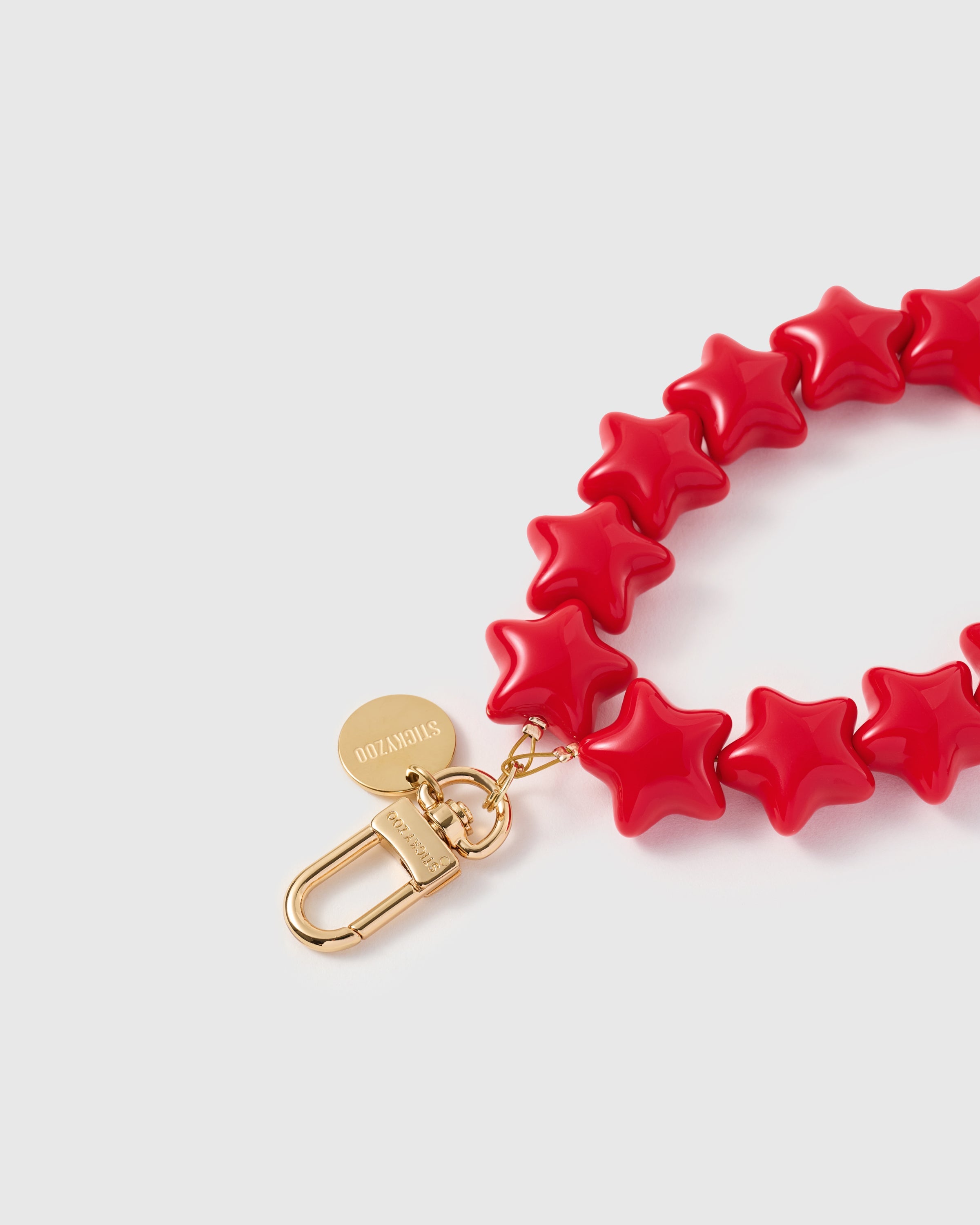 CRIMSON STAR PHONE STRAP