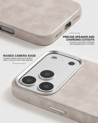 Precise speaker and charging cutouts with a raised camera edge on the cream Heritage Leather Case
