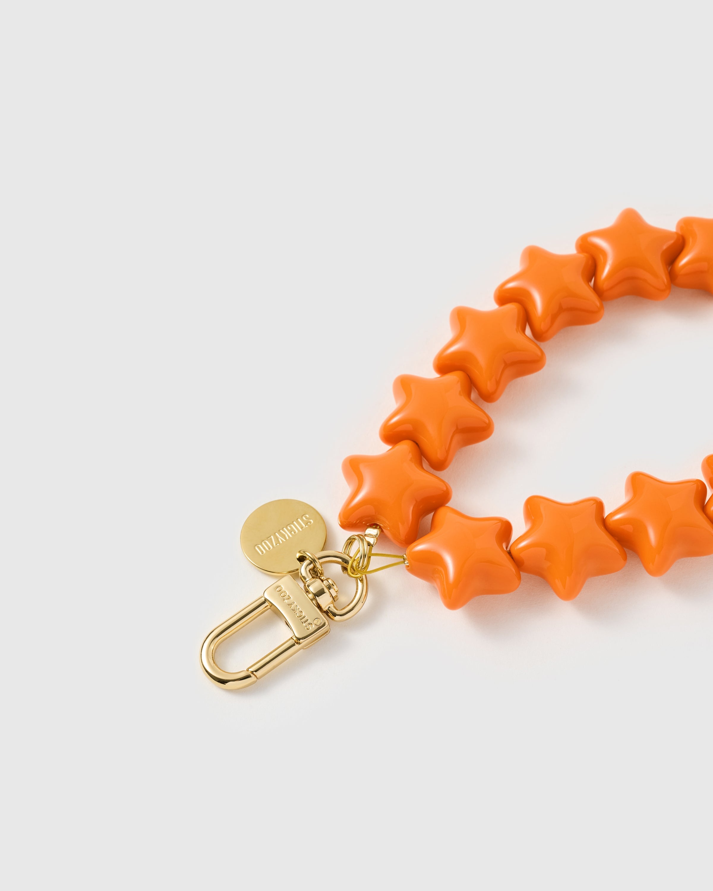 TANGERINE STAR PHONE STRAP