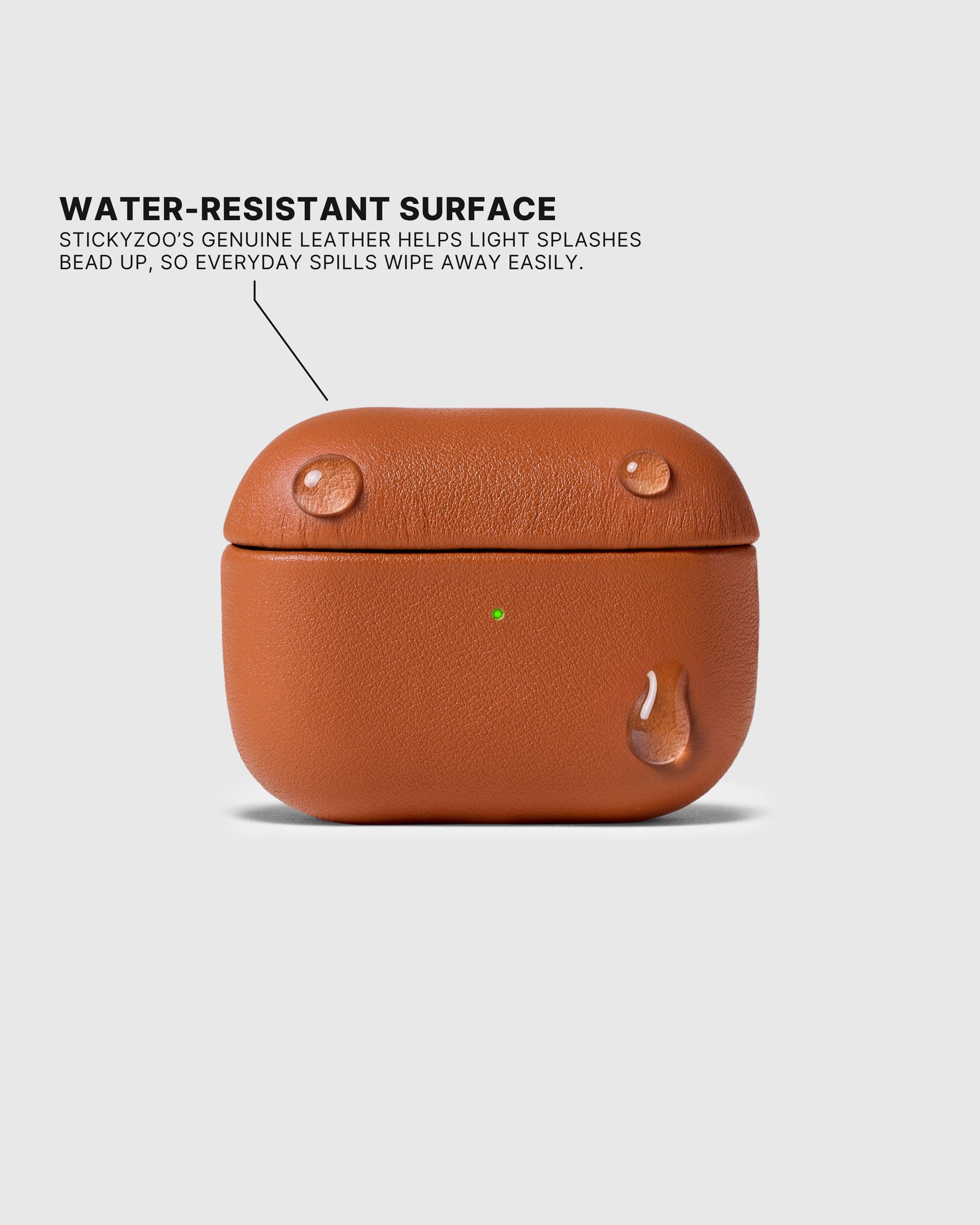 Water droplets beading on the Cognac AirPods case surface