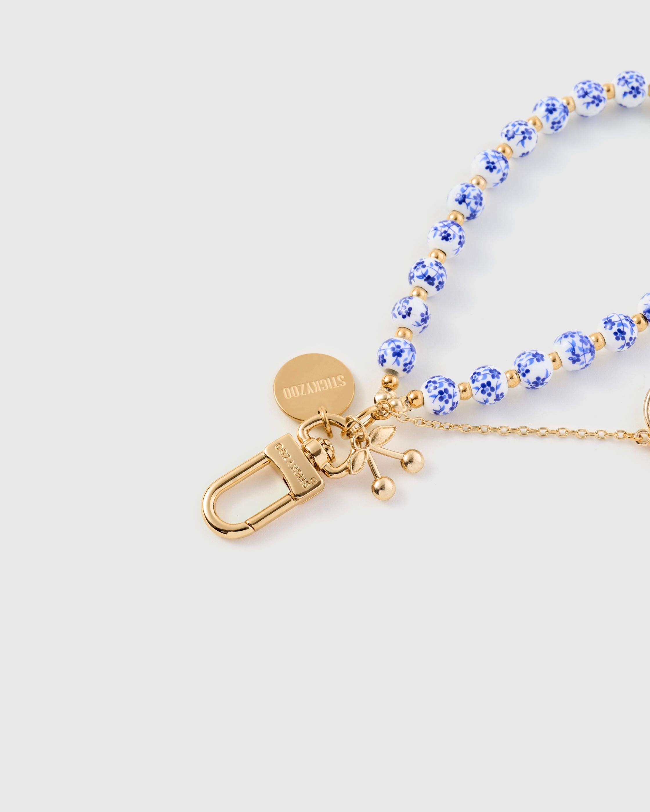 PORCELAIN BLOOM CHARM PHONE STRAP