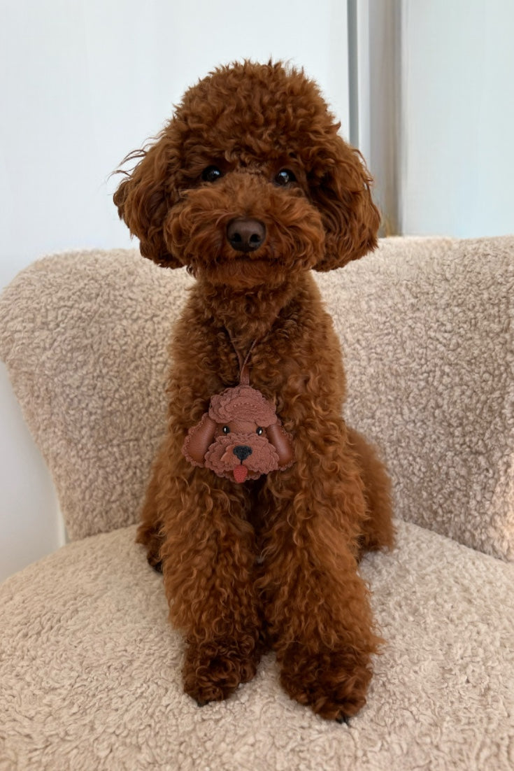 Handmade Poodle leather bag charm — built to last from full-grain French Alran goatskin, hand-layered, hand-stitched. STICKYZOO Amsterdam design.