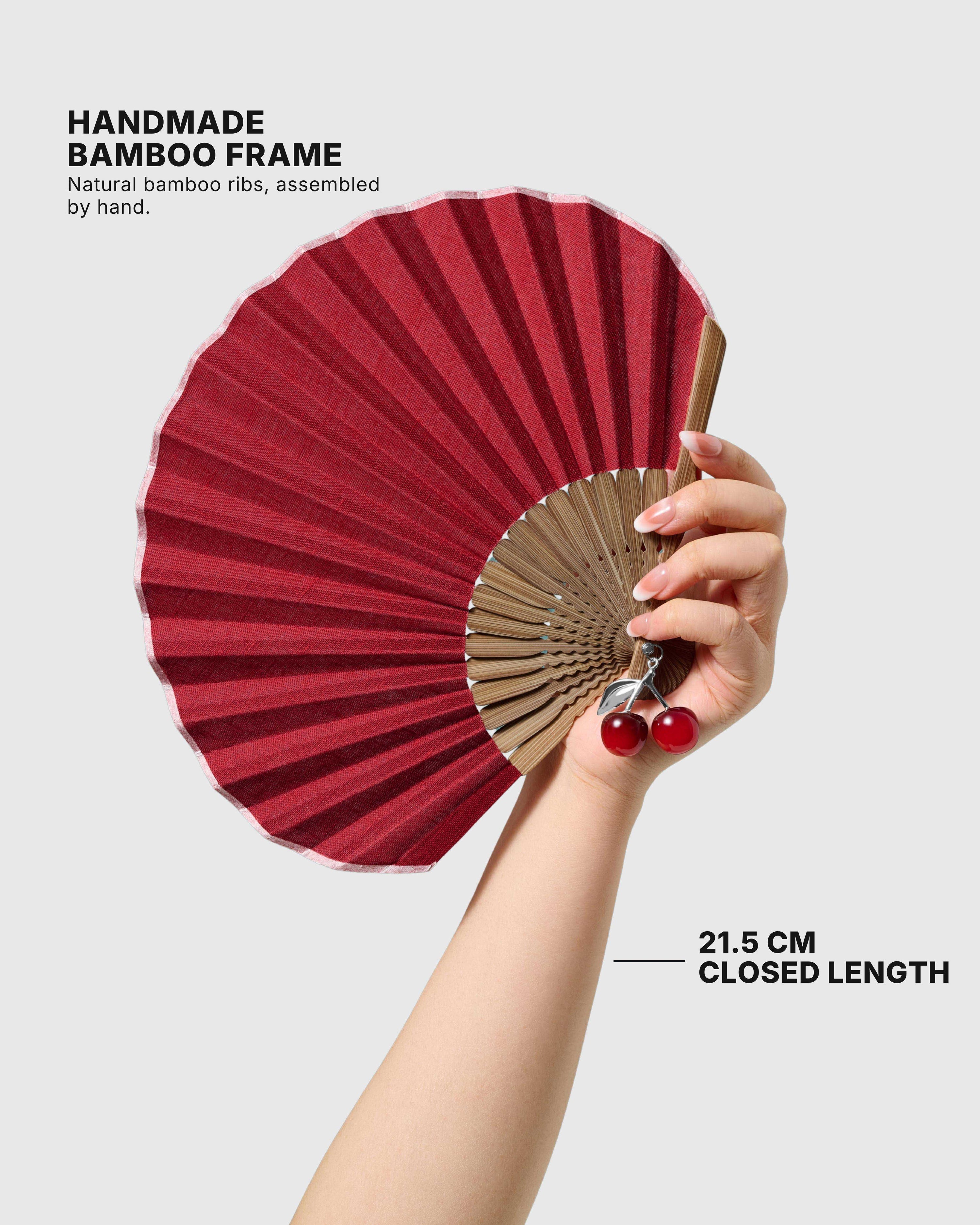 Handmade bamboo frame detail and 21.5 cm closed hand fan length