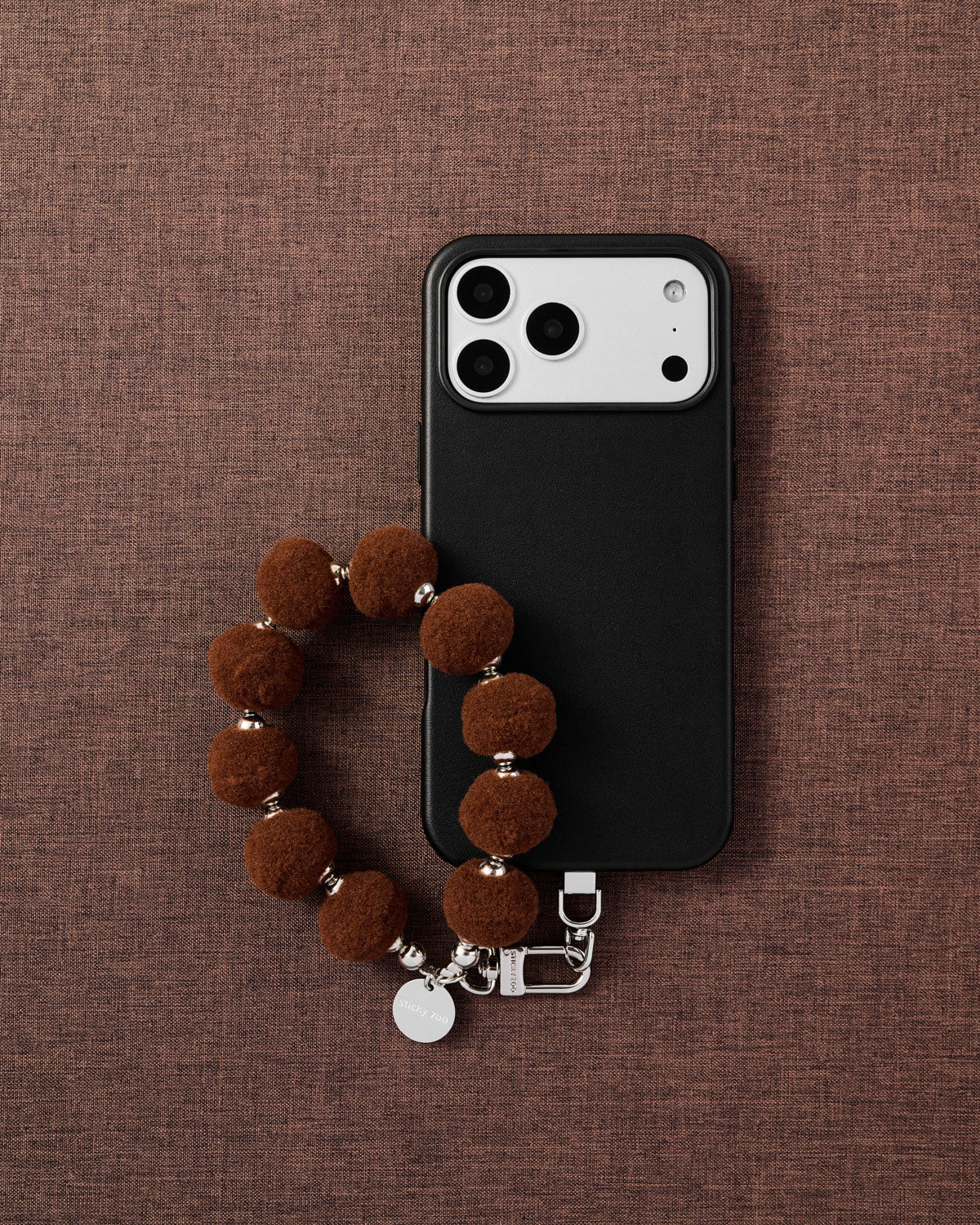 BROWN POM PHONE STRAP