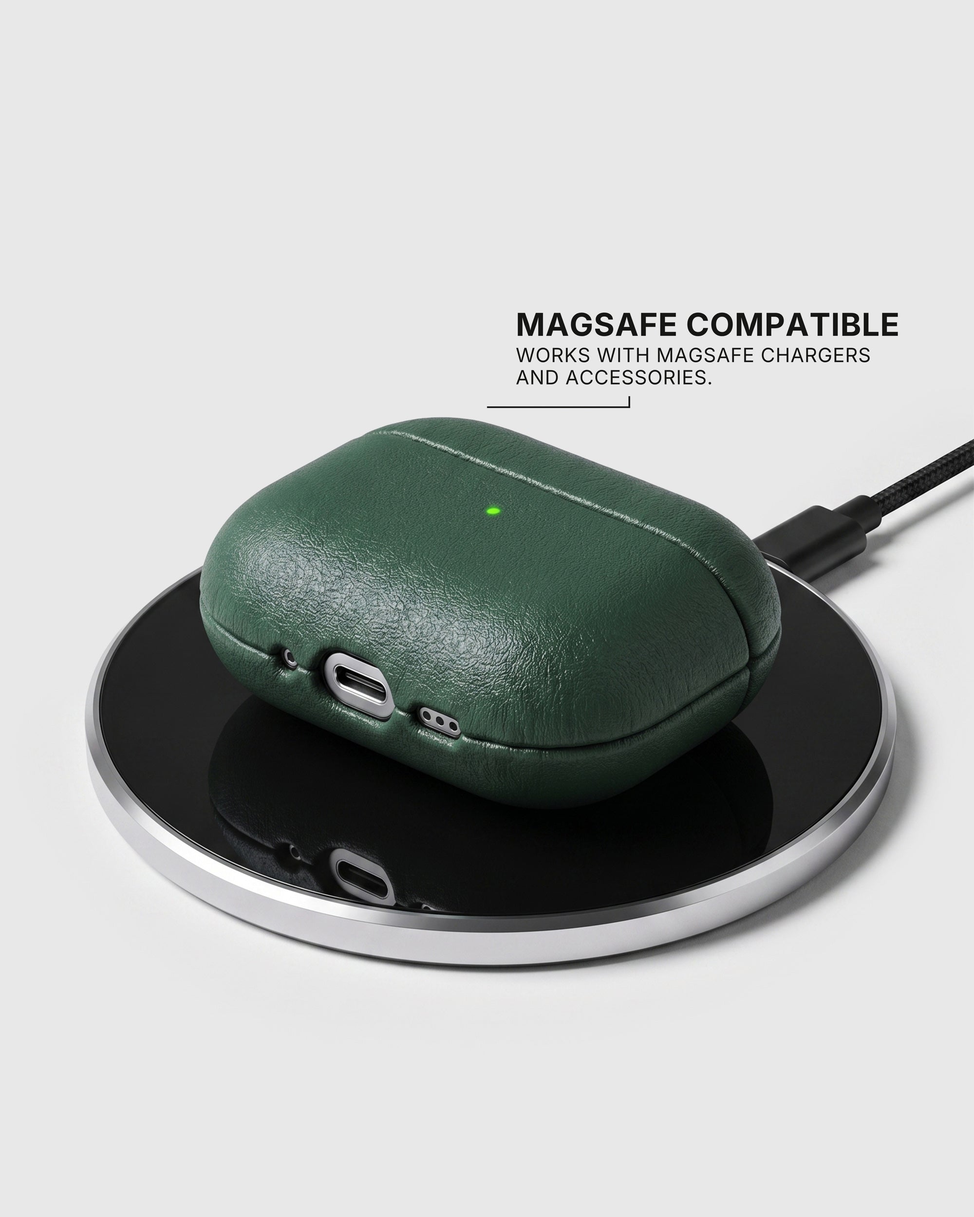 Green AirPods case on a wireless charging pad with text stating MagSafe compatibility