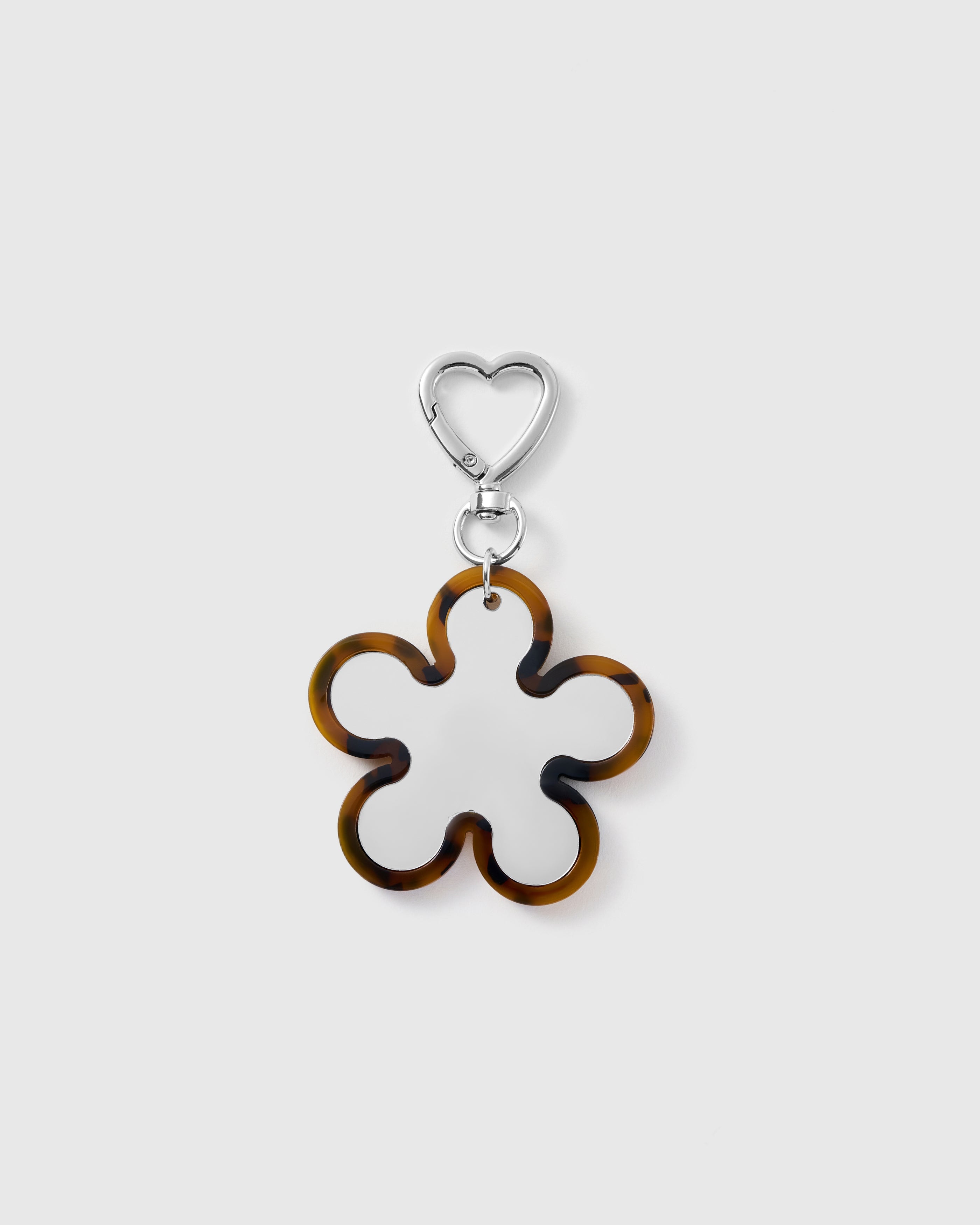 STICKYZOO Margot Flower Charm with an open five-petal amber-and-black tortoiseshell-pattern outline and silver-tone heart-shaped clasp
